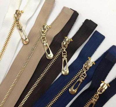 義烏廠家專業(yè)生產(chǎn)3號(hào)黃銅鍍淺金 黃金開口條裝拉鏈